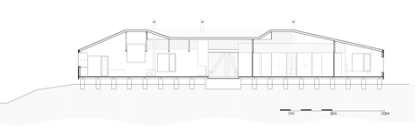Long section of MAPA architects create sheds within sheds for Chilean mountain hideaway