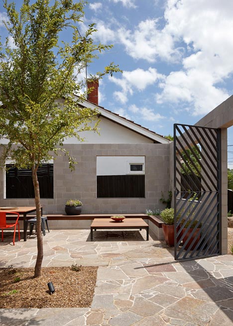 Melbourne house by MRTN Architects features courtyard with window-like apertures