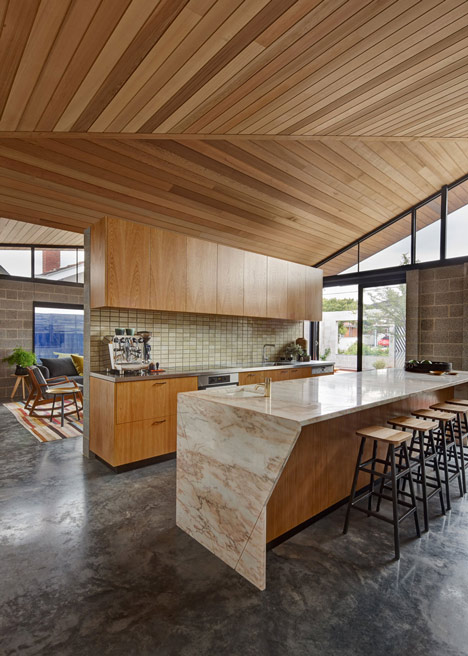 Melbourne house by MRTN Architects features courtyard with window-like apertures
