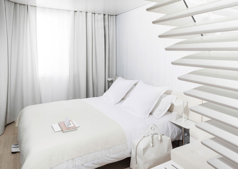 Okko hotel interior by Patrick Norguet with en suites hidden behind louvred walls