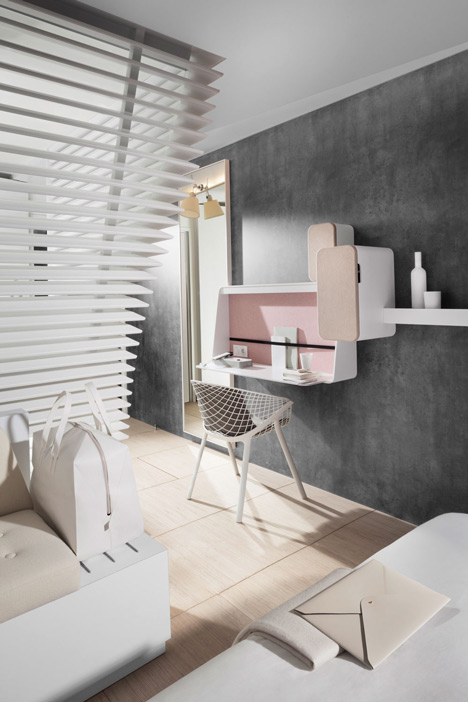 Okko hotel interior by Patrick Norguet with en suites hidden behind louvred walls
