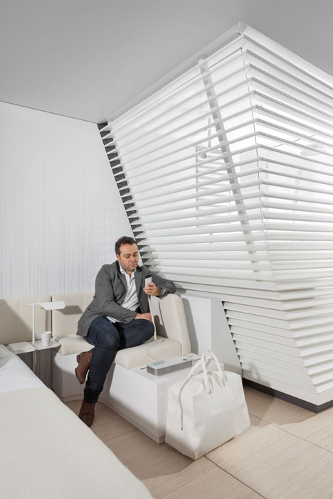 Okko hotel interior by Patrick Norguet with en suites hidden behind louvred walls