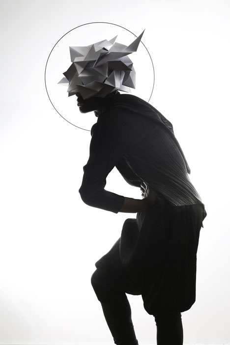 Origami headgear folded to resemble mythological creatures
