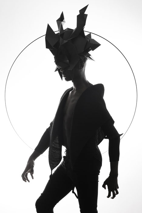 Origami headgear folded to resemble mythological creatures