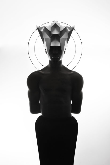 Origami headgear folded to resemble mythological creatures