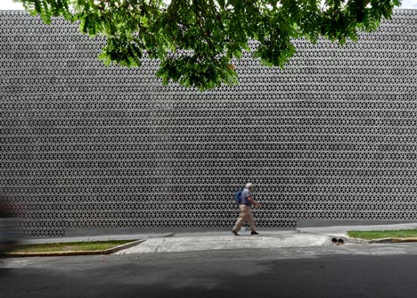 Perforated concrete walls encase La Tallera gallery by Frida Escobedo