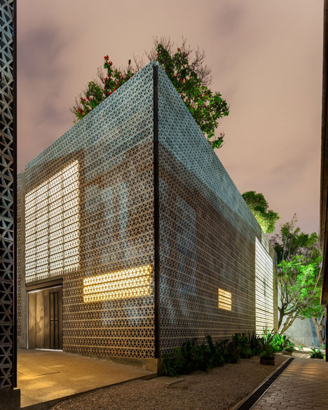 Perforated concrete walls encase La Tallera gallery by Frida Escobedo