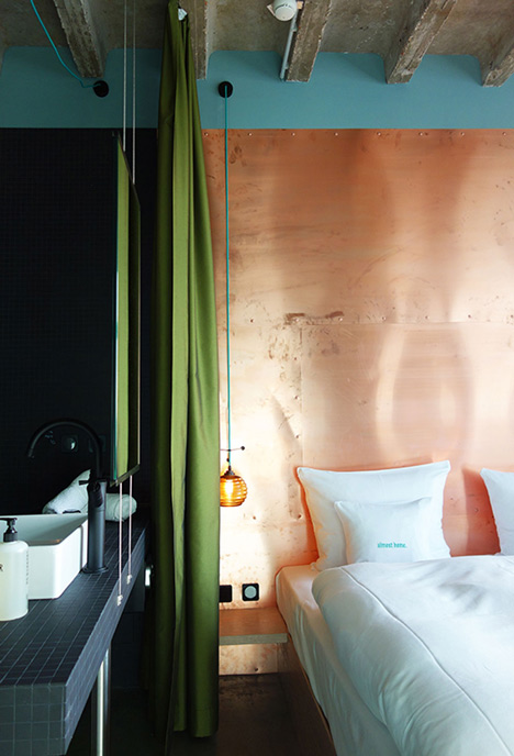 Plants create urban jungle at Berlin hotel by Studio Aisslinger