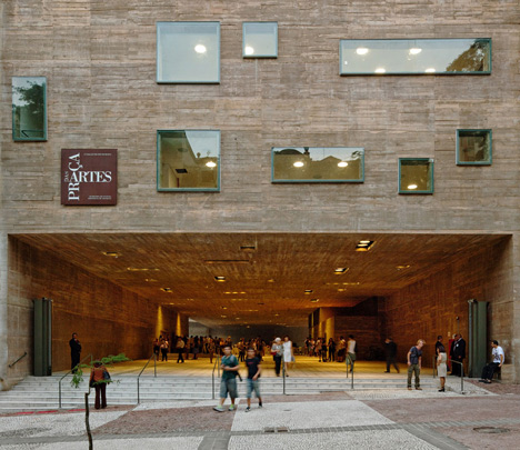 Praca das Artes by Brasil Arquitetura features concrete boxes projecting over a public plaza