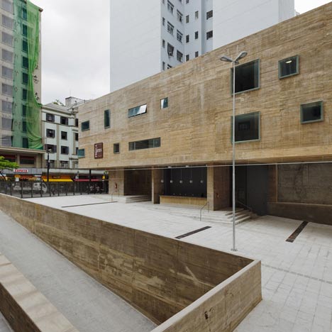 Praca das Artes by Brasil Arquitetura features concrete boxes projecting over a public plaza