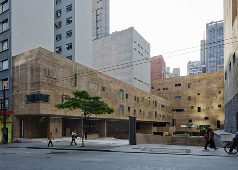 Praca das Artes by Brasil Arquitetura features concrete boxes projecting over a public plaza