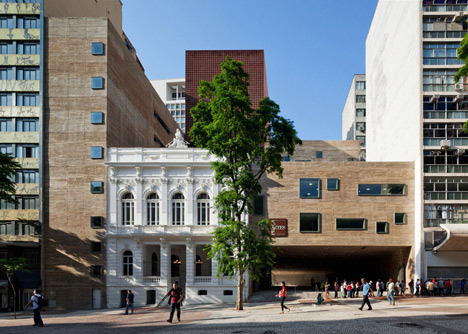 Praca das Artes by Brasil Arquitetura features concrete boxes projecting over a public plaza