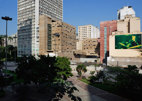 Praca das Artes by Brasil Arquitetura features concrete boxes projecting over a public plaza