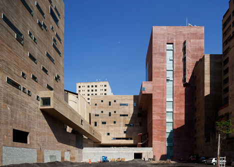 Praca das Artes by Brasil Arquitetura features concrete boxes projecting over a public plaza