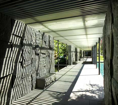 Raised outdoor cabins connected to Goodwood Residence apartments by WOHA