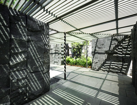 Raised outdoor cabins connected to Goodwood Residence apartments by WOHA