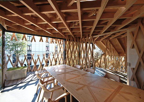SunnyHills cake shop by Kengo Kuma encased within intricate timber lattice