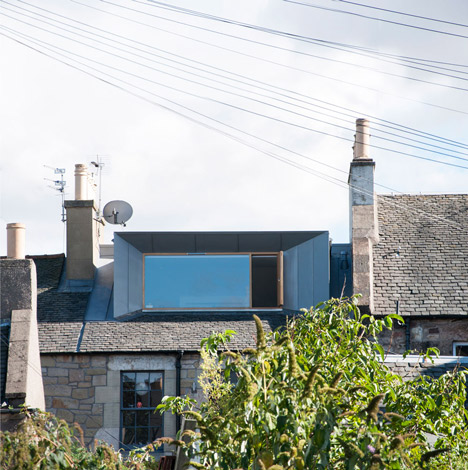 Zinc-clad loft extension by Konishi Gaffney creates an extra bedroom
