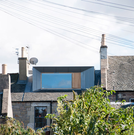 Zinc-clad loft extension by Konishi Gaffney creates an extra bedroom
