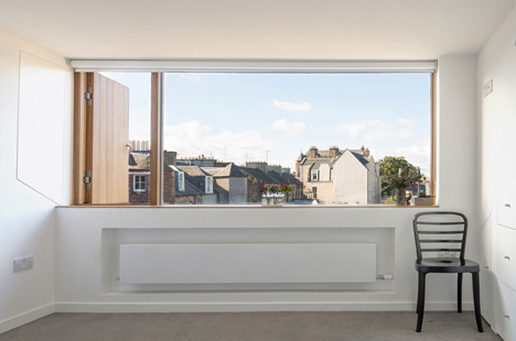 Zinc-clad loft extension by Konishi Gaffney creates an extra bedroom