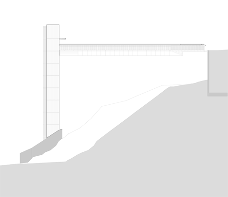 Elevation of steel-clad outdoor elevator connects the city and suburb in Pamplona by AH Asociados