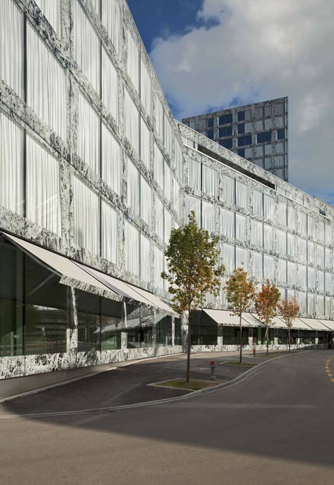 Allianz Headquarters by Wiel Arets features glass fritted to resemble Mies' Barcelona Pavilion