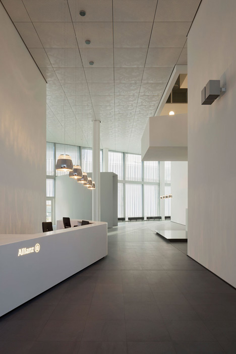 Allianz Headquarters by Wiel Arets features glass fritted to resemble Mies' Barcelona Pavilion