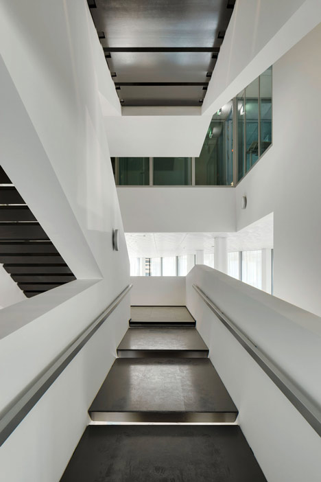 Allianz Headquarters by Wiel Arets features glass fritted to resemble Mies' Barcelona Pavilion