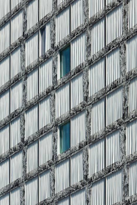 Allianz Headquarters by Wiel Arets features glass fritted to resemble Mies' Barcelona Pavilion