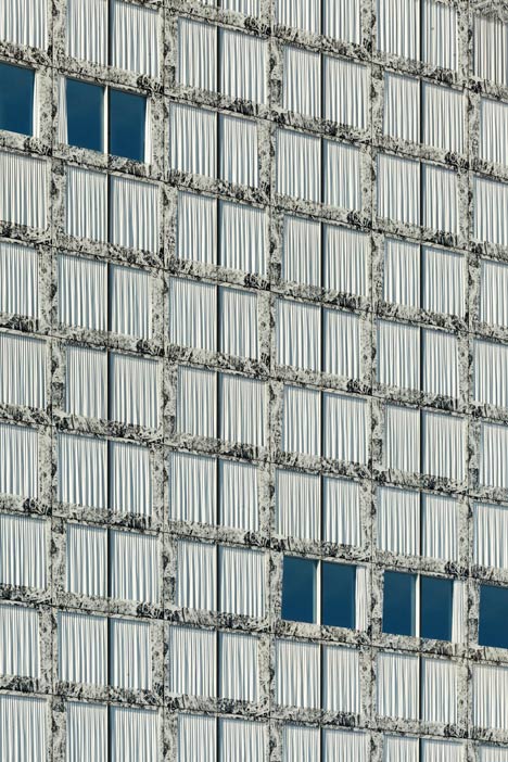 Allianz Headquarters by Wiel Arets features glass fritted to resemble Mies' Barcelona Pavilion