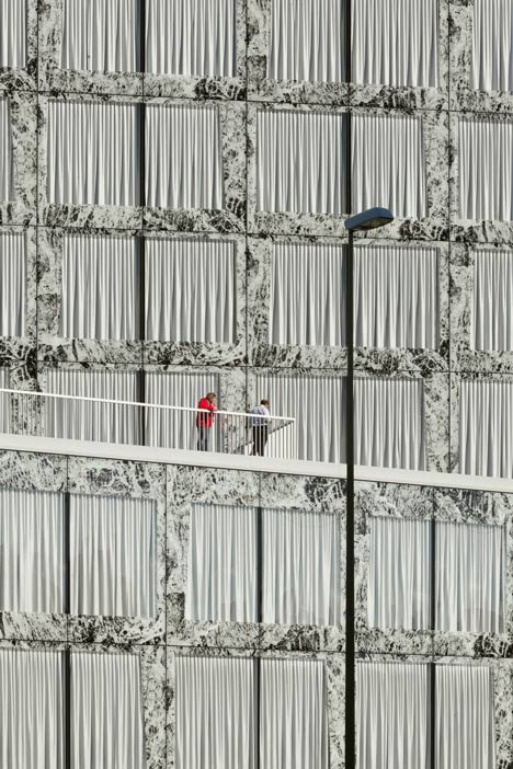 Allianz Headquarters by Wiel Arets features glass fritted to resemble Mies' Barcelona Pavilion