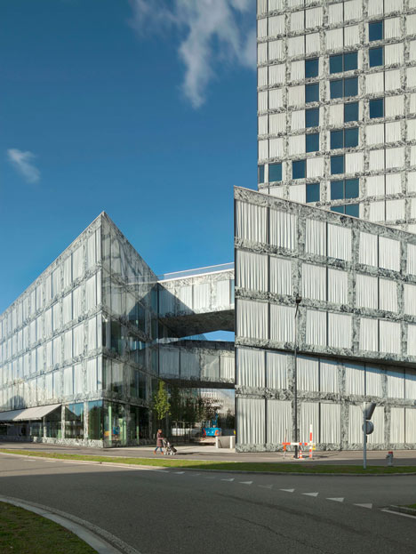 Allianz Headquarters by Wiel Arets features glass fritted to resemble Mies' Barcelona Pavilion