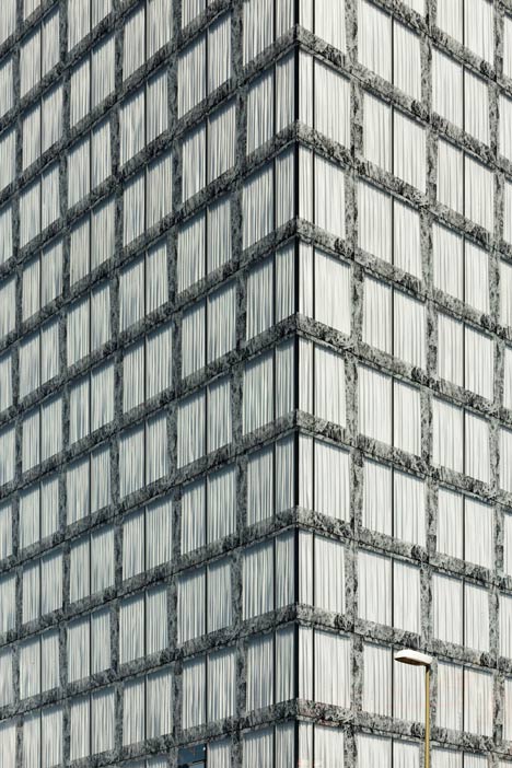 Allianz Headquarters by Wiel Arets features glass fritted to resemble Mies' Barcelona Pavilion