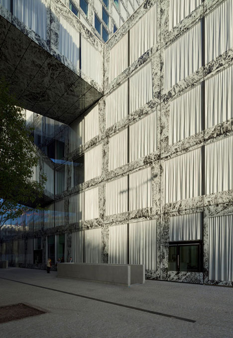 Allianz Headquarters by Wiel Arets features glass fritted to resemble Mies' Barcelona Pavilion