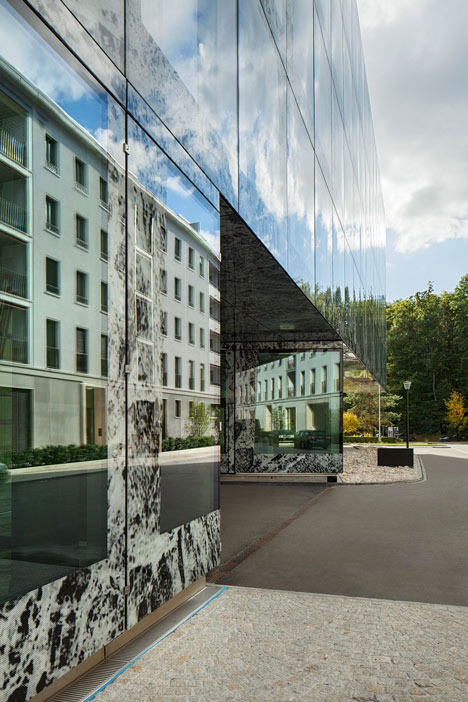 Allianz Headquarters by Wiel Arets features glass fritted to resemble Mies' Barcelona Pavilion