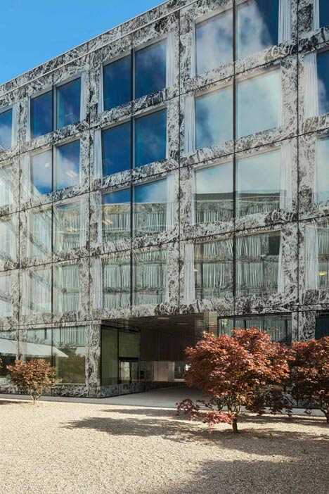 Allianz Headquarters by Wiel Arets features glass fritted to resemble Mies' Barcelona Pavilion