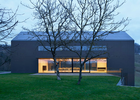 Black Barn by Arhitektura d.o.o. provides panoramic views of the Slovenian countryside