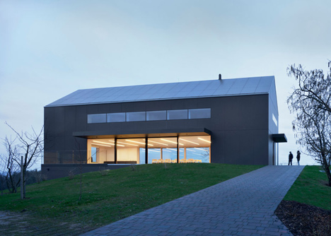 Black Barn by Arhitektura d.o.o. provides panoramic views of the Slovenian countryside