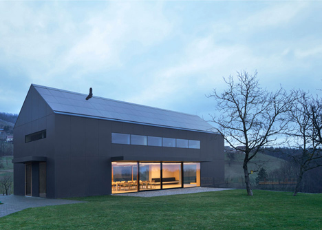 Black Barn by Arhitektura d.o.o. provides panoramic views of the Slovenian countryside