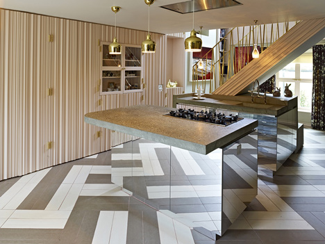 AOC Architecture adds wall-hung bicycles and basket-weave flooring to London townhouse