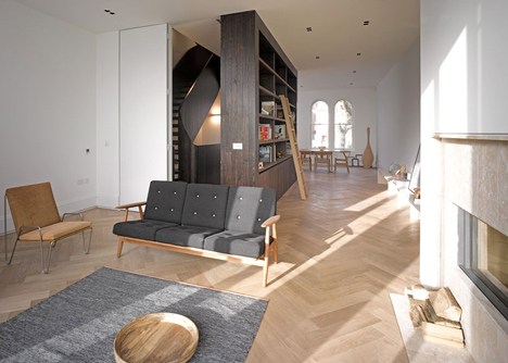 Curvacious oak staircase ascends through converted London convent by John Smart Architects
