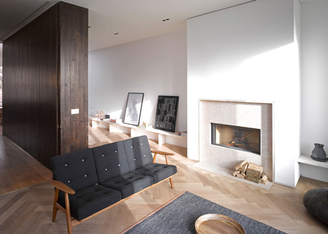 Curvacious oak staircase ascends through converted London convent by John Smart Architects