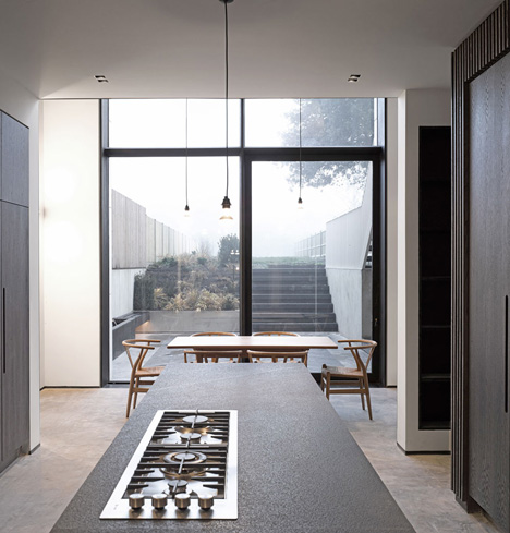 Curvacious oak staircase ascends through converted London convent by John Smart Architects