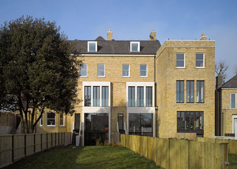 Curvacious oak staircase ascends through converted London convent by John Smart Architects