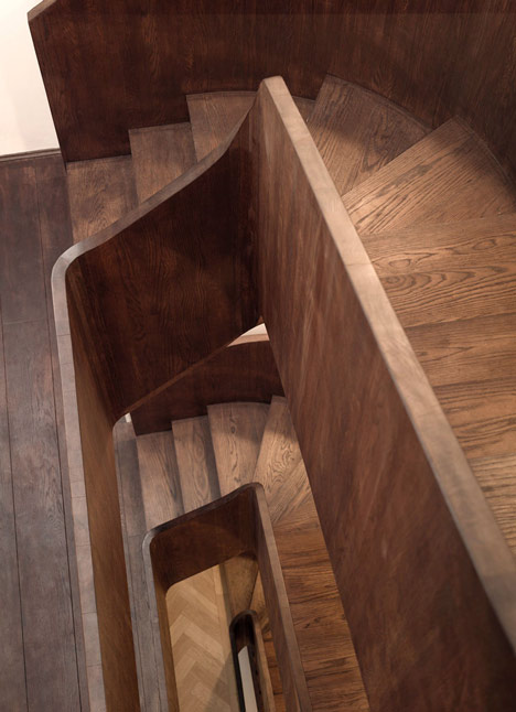 Curvacious oak staircase ascends through converted London convent by John Smart Architects