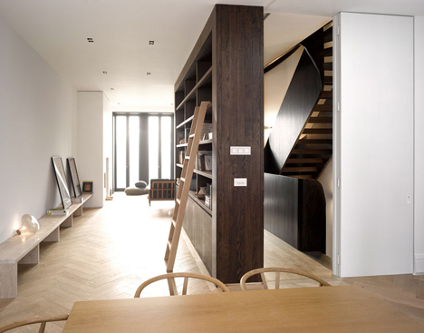 Curvacious oak staircase ascends through converted London convent by John Smart Architects