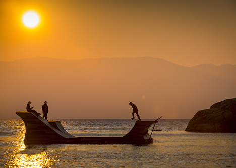 Floating skateboard ramp on Lake Tahoe by Jeff Blohm and Jeff King