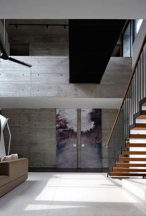 Formwerkz Architects house extension features cantilevered concrete box