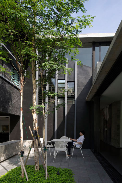Formwerkz Architects house extension features cantilevered concrete box