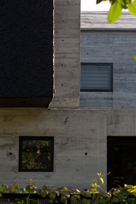 Formwerkz Architects house extension features cantilevered concrete box
